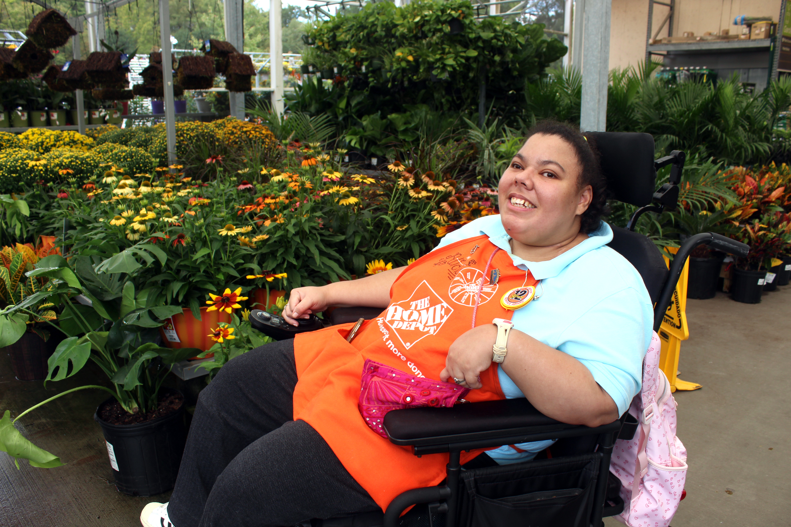 Alicia enjoys working among the plants in Home Depot's Garden Center.