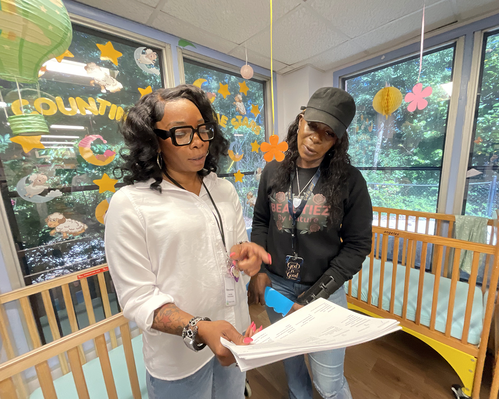 Bianca Johnson, Frazer's Infant & Toddler Curriculum Coordinator, discusses possibilities with Infant Lead Teacher, Lakeysha Sanders during a recent in-service training day.