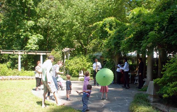 An event gathering in Cator Woolford Gardens