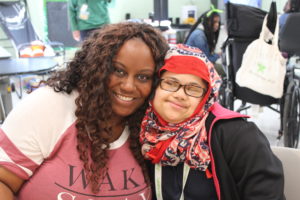 October DSP of the Month Megan Kennerly (L) with Tahmina, Adult Program participant