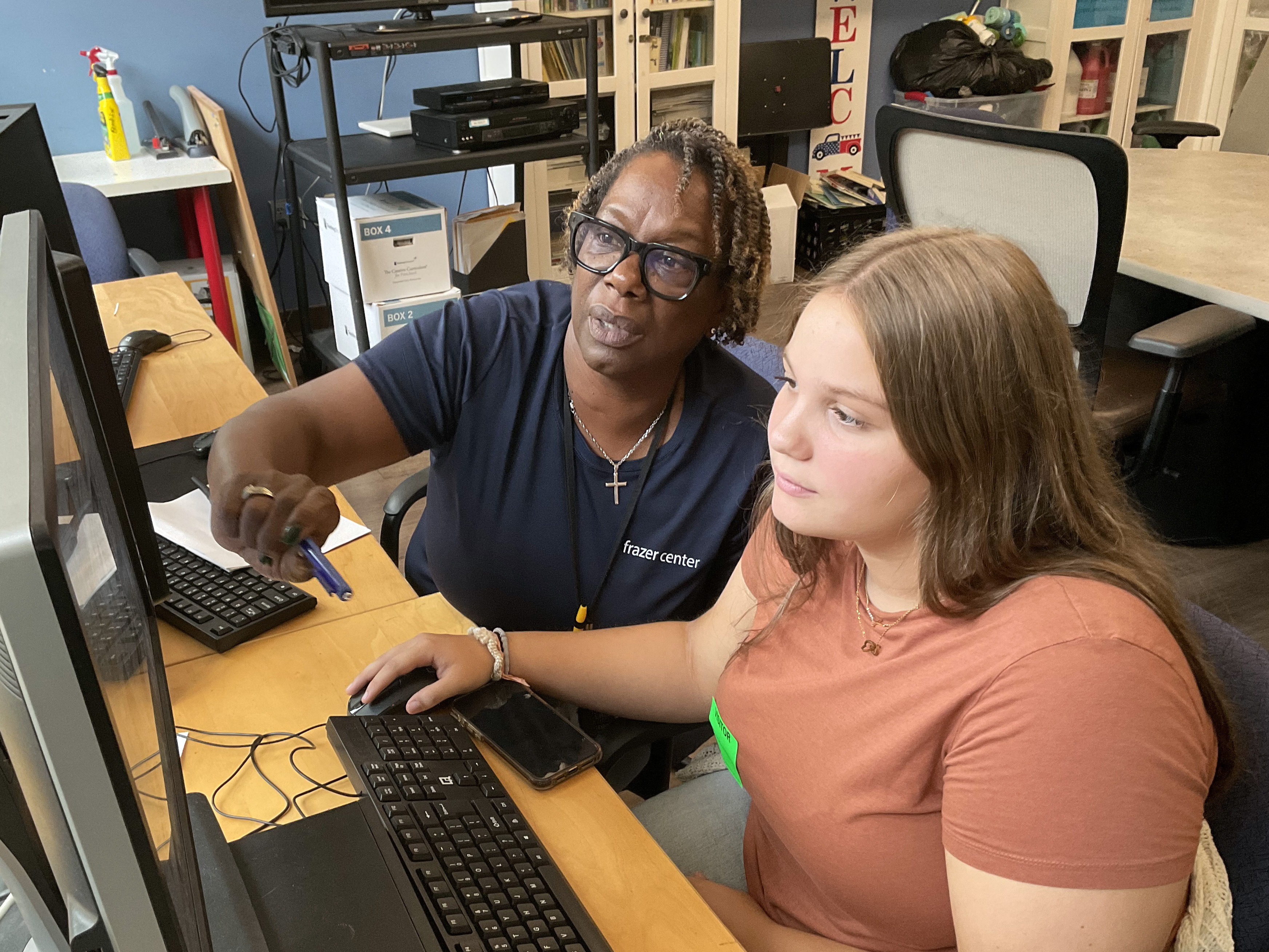 Gigi, in her role as Senior Lead Teacher, provides guidance to a new teacher.