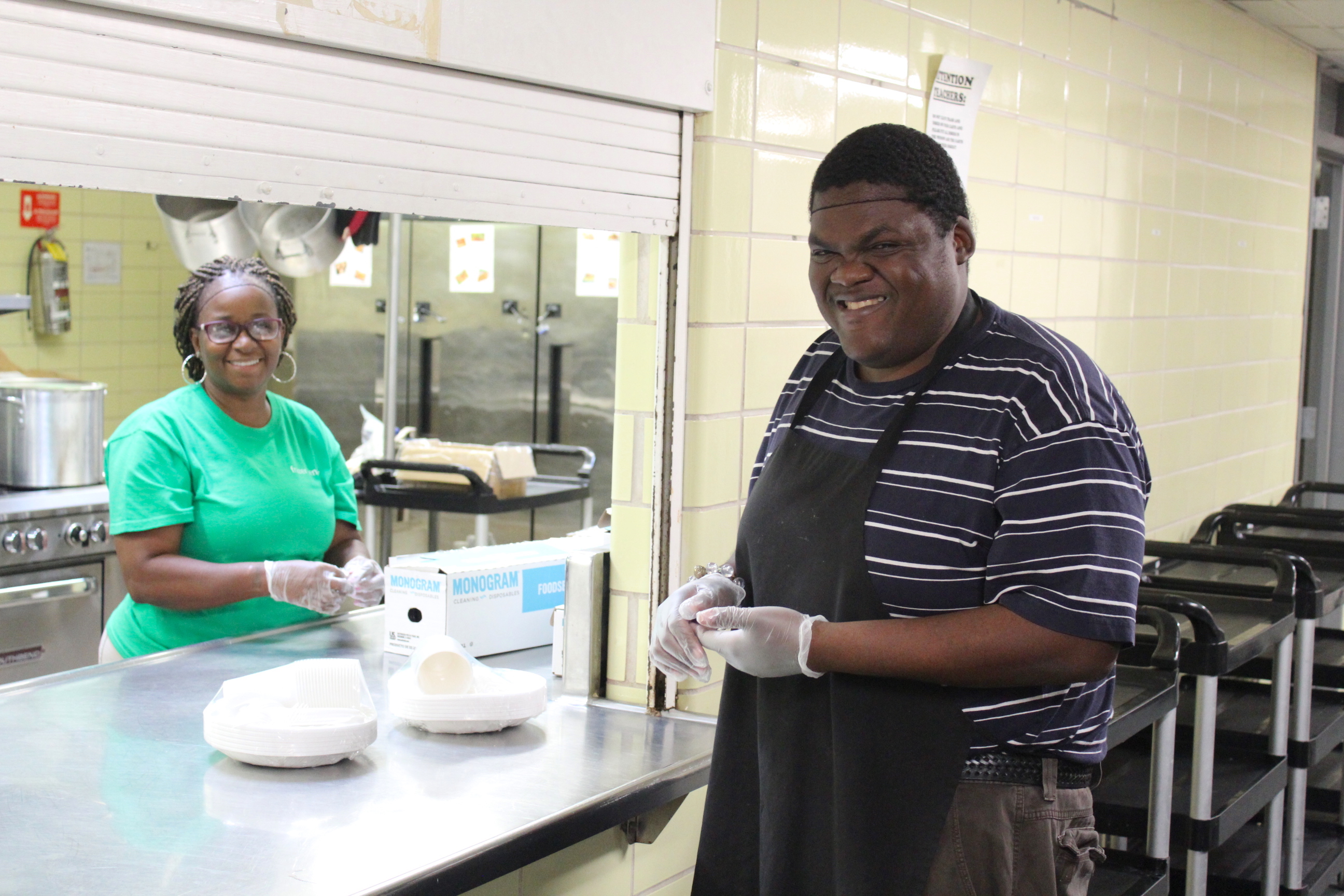 Anthony with Kitchen Manager Velecia Wright