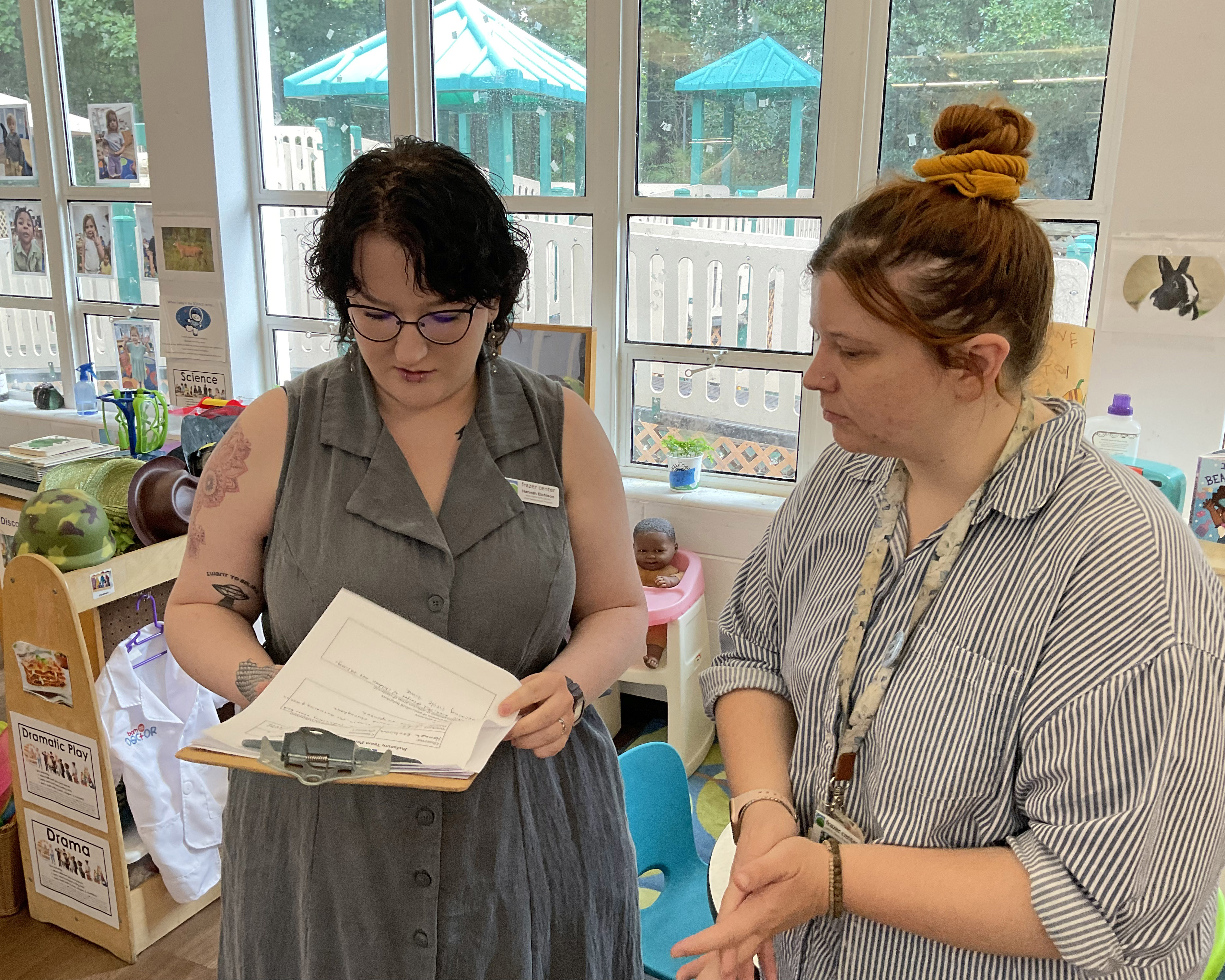 Inclusion Specialist Hannah conferring with Teacher Nikki