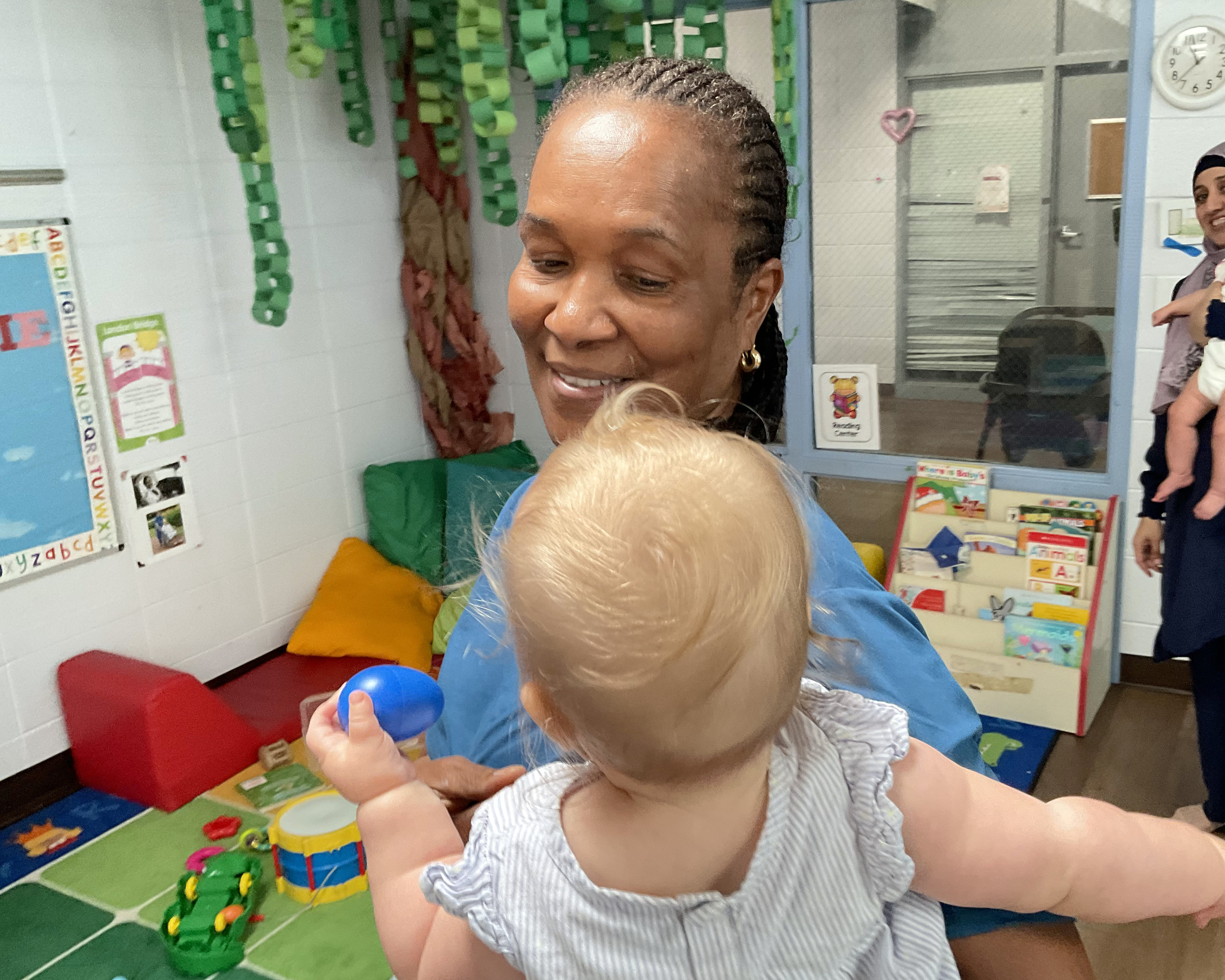 Karimati the “Baby Whisperer” working her magic