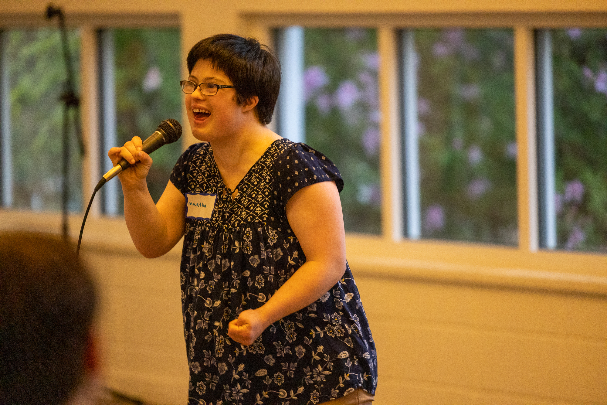 One of L’Arche’s Open Mic Night performers (Photo Credit: L’Arche Atlanta)