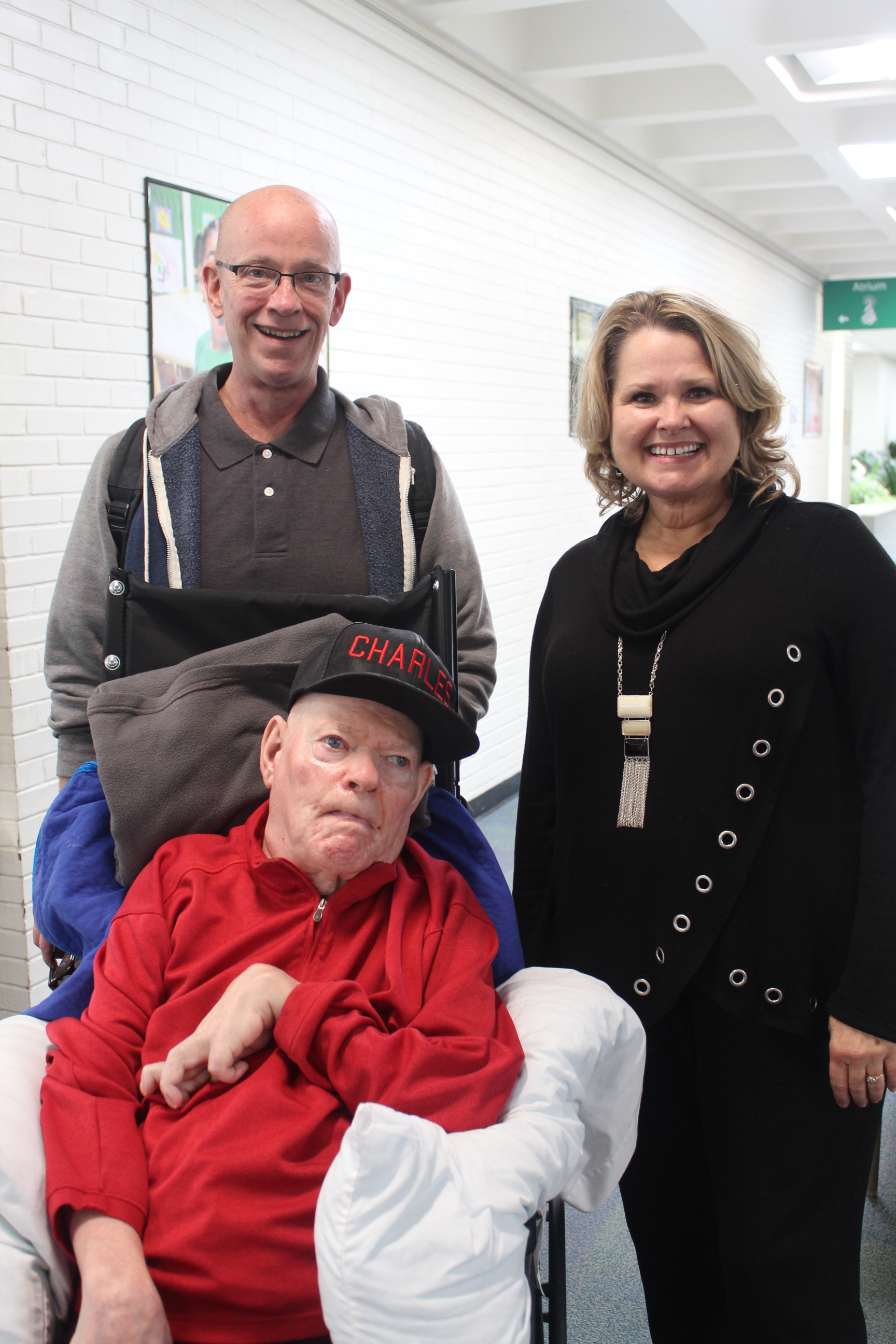 Charlie with brother Sammy and Frazer Center Executive Director Paige McKay Kubik