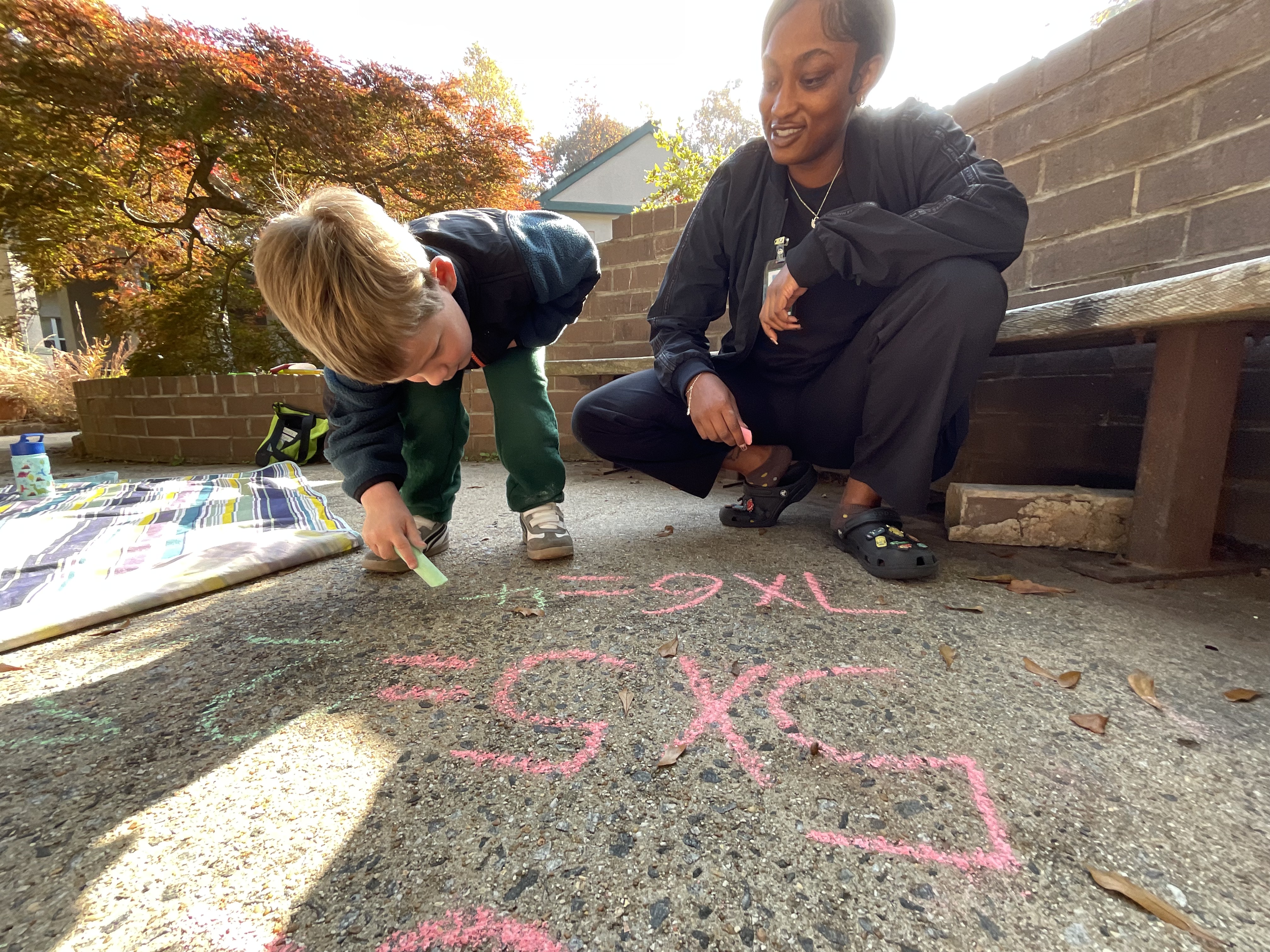 Leon solves math problems posed by his therapist, Carteria.