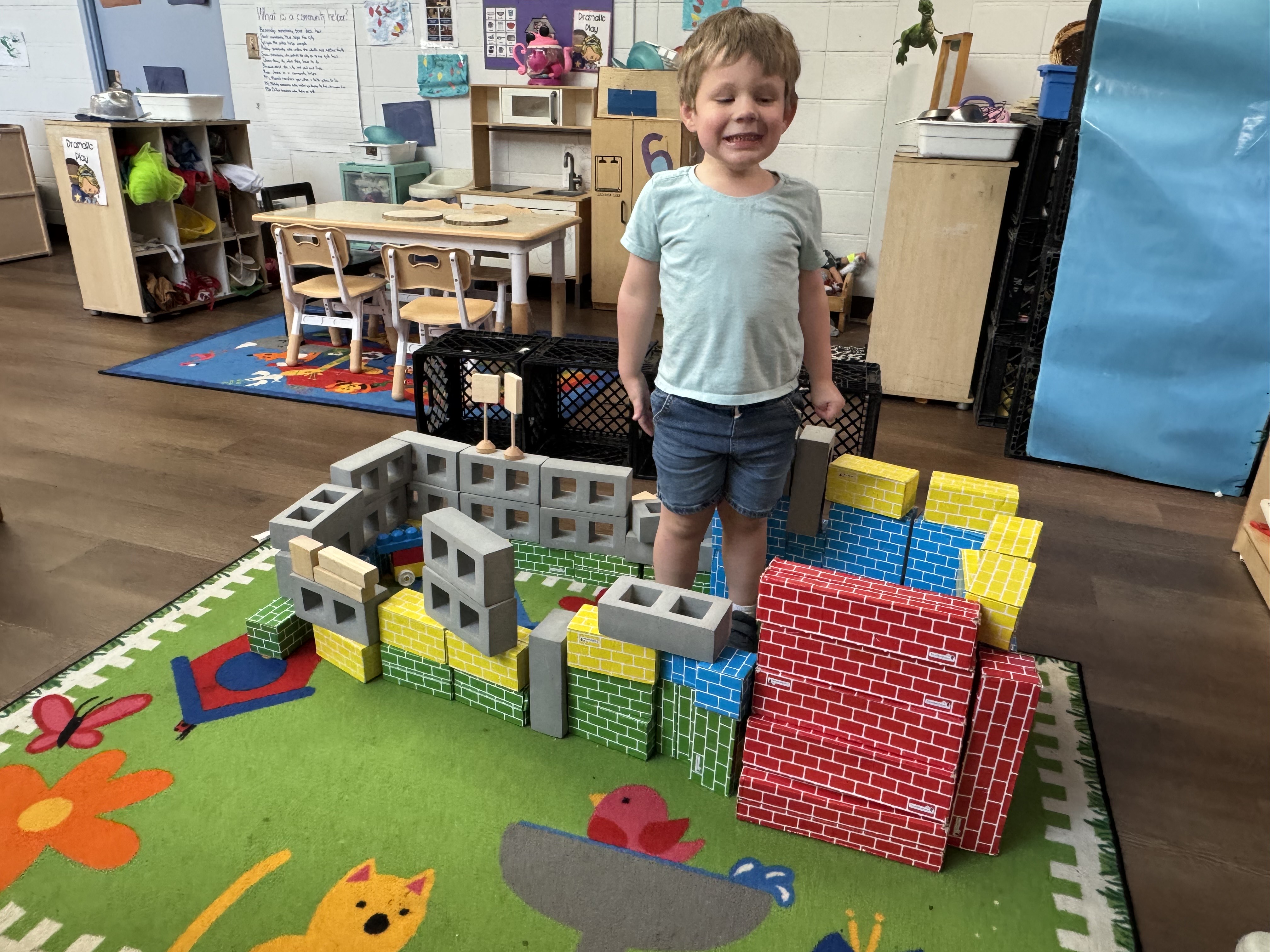 Leon showing off his construction work.