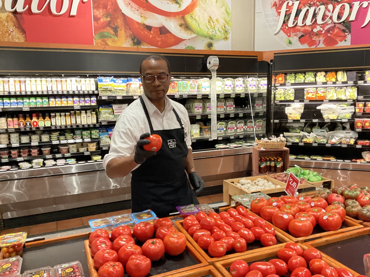 Jonathan inspecting produce
