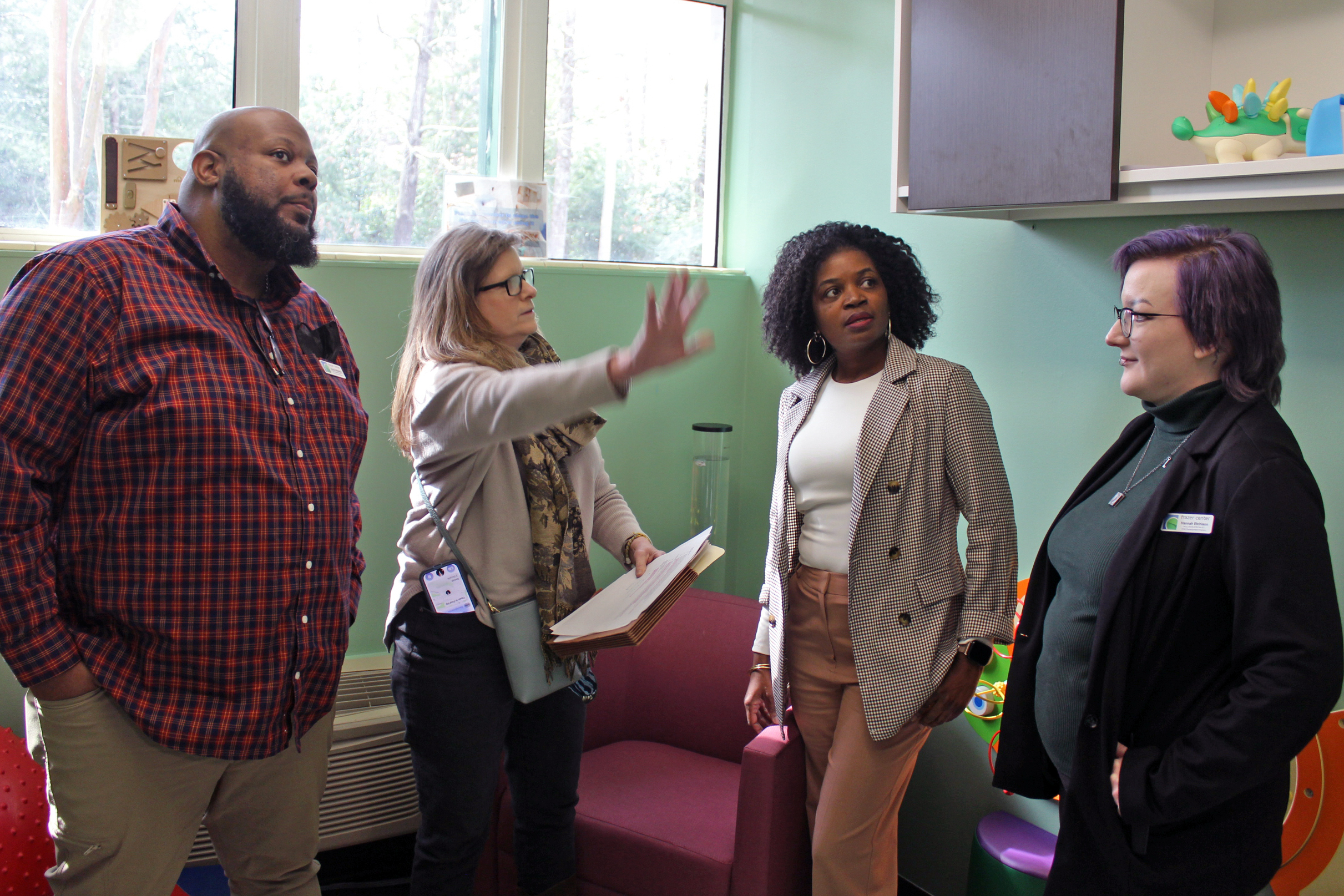 Susie (2nd from right) and the Inclusion Team envision possibilities for one of Frazer's sensory rooms with consultant Stacey Ramirez (2nd from left).