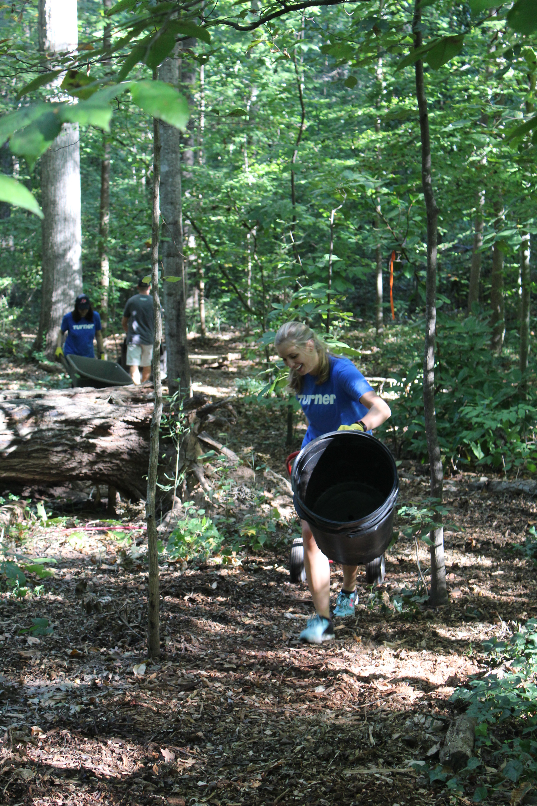 Turner employees doing some “mulch”-needed work on the forest paths